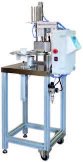 Automatic sealing machine for cups (containers)