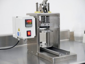 Manual cup (container) sealer