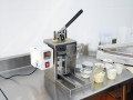 Manual cup (container) sealer